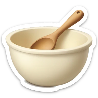 A cream ceramic baking bowl with a wooden spoon in it sticker