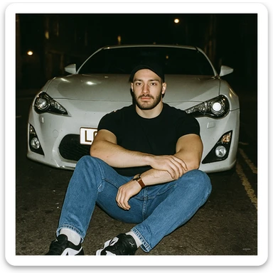 Grunge-style analog photo, London 2025, person inspired by the new reference image sitting on the ground, Nissan GT 86 behind, model pose, black t-shirt, jeans, Nike Air Jordan low, using flash, urban night, analog grain, 7/8. sticker