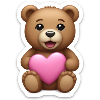 Teddy bear holding a pink heart sticker