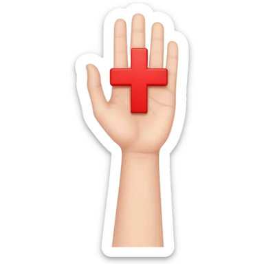 hand holding up a red cross sticker