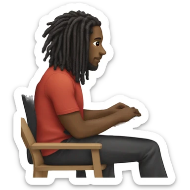 Black-guy-with-dreads-wearing-black-trackstuit-sitting-down-on-chair facing-foward-focused-on-laptop-computer- sticker