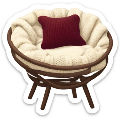 Cozy cream papasan chair with maroon pillow and chunky knit blanket sticker