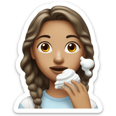 Girl getting white icing on her face sticker