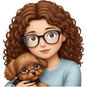 Girl with brown curly hair wearing glasses cuddling with a cute yorkie sticker