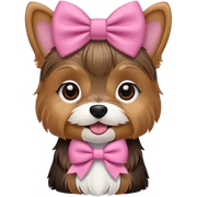 A mini Yorkie Terrier with a pink bow and Aria
 sticker