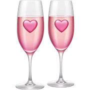 two glasses of champagne with pink heart-shaped ice cubes sticker