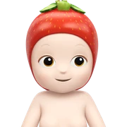 red-haired girl with fruit sticker