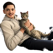 smiling boy holding cat sticker