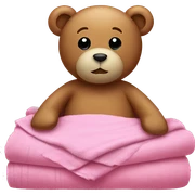 Teddy in bed with pink sheets and a towel sticker