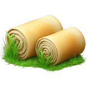 Two rolls of dough with grass growing on top sticker