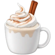 white mug of hot chocolate with whipped cream and cinnamon sticker