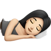 white girl with straight black hair laying down on a pillow sticker