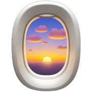 plane window with sunset sticker