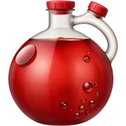 a pomegranate and a plastic 20 liter container of used or burnt cooking oil with RAD Oil in it sticker