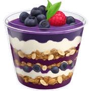 Açaí in a clear cup with layers of fruits and granola and condensed milk sticker