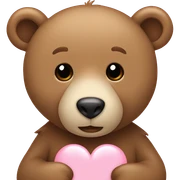 Light brown bear holding a light pink heart sticker
