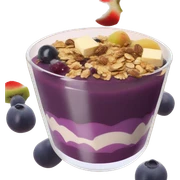 Açaí in a clear cup with layers of fruits and granola and condensed milk sticker