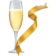 A glass of champagne with a ribbon sticker