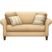 Beige couch with cozy blankets on it sticker