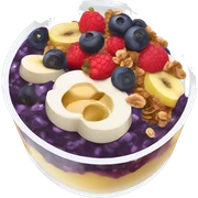 Açaí in a clear cup with layers of fruits and granola and condensed milk sticker
