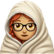 cozy girl wrapped in a blanket with glasses and red hair sticker