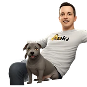 smiling boy indoors with pet sticker