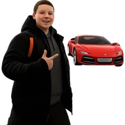smiling boy beside a car sticker