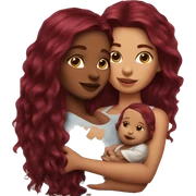 Beautiful tattooed burgundy long haired woman holding a baby sticker