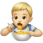 Baby boy eating sticker