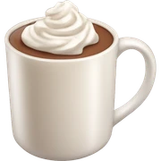 beige mug of hot chocolate with whipped cream and cinnamon sticker