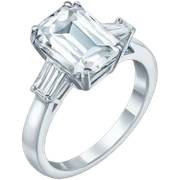 An emerald cut ring with a giant diamond  sticker