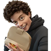 smiling boy holding food sticker