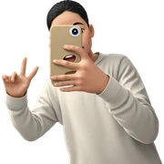 boy taking selfie against wall sticker