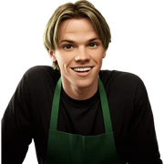 smiling boy in green apron sticker