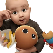 boy holding food and toy sticker