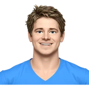 smiling boy in blue shirt sticker
