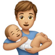 A person holds a baby sticker