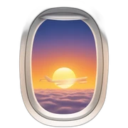 plane window with sunset sticker