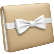 beige macbook with white bow  sticker