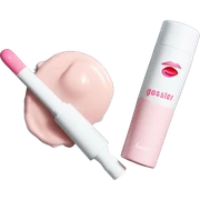 White mascara wand, next to a white cosmetics bag, white and pink lipstick, and a white container with pink blush make the brand glossier  sticker