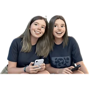 smiling girls outdoors with phone sticker