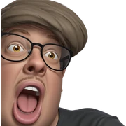 boy with glasses showing tongue sticker