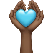 Hands holding a babyblue heart sticker