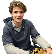 smiling boy indoors with shirt sticker