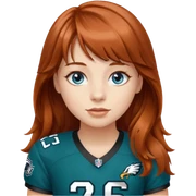 Girl with bangs, longer wavy auburn hair and blue eyes 
wearing #26 eagles jersey sticker