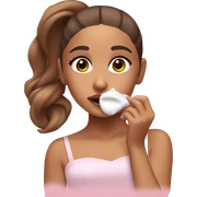 Ariana grande applying cream on face sticker