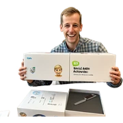 smiling boy with box indoors sticker