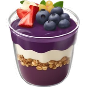 Açaí in a clear cup with layers of fruits and granola and condensed milk sticker