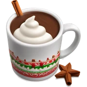 Decorated Christmas mug of hot chocolate with whipped cream and cinnamon sticker