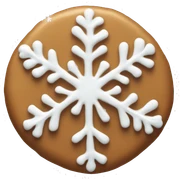 Cinnamon cookie with white frosting and a snowflake sticker